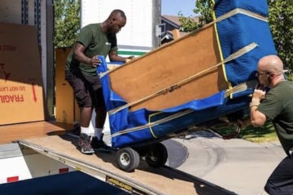 International Van Lines movers moving into a truck